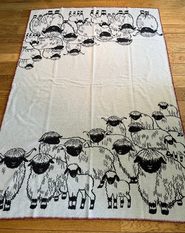 King - size blankets to cover large beds comfortablyBlacknose Sheep blanket, red border