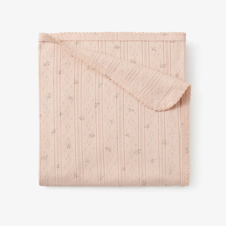 Linen blankets with a rustic and textured lookBlush Floral Organic Pointelle Cotton Baby Blanket