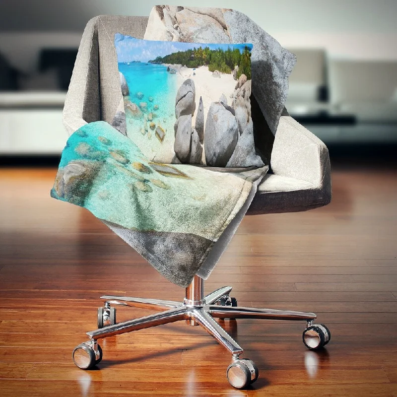 Silk blankets with a smooth and elegant touchDesignart 'Turquoise Ocean Water with Rocks' Modern Seascape Throw Blanket