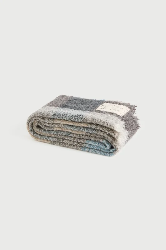 Cashmere blankets for ultimate softness and luxuryLM X Stansborough Felted Wool Scarf